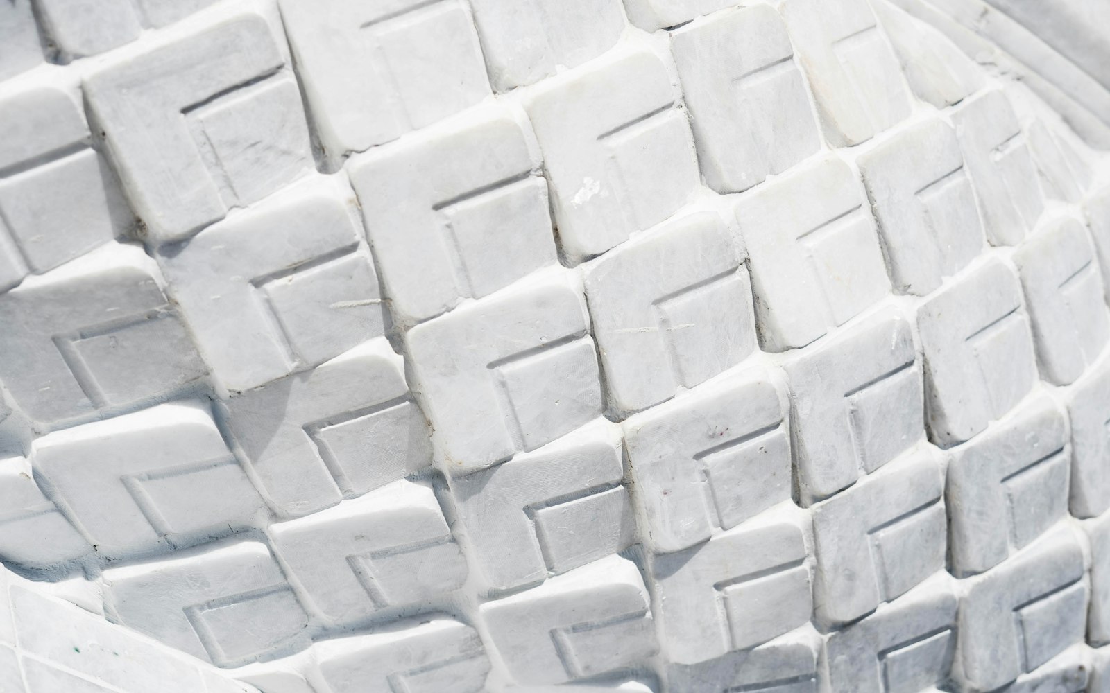 Rubber outsole tread blocks in close-up, the wear layer of a combination sole